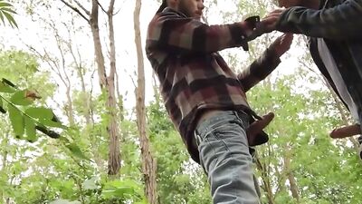 Kinky dude gives his boyfriend a blowjob in the woods
