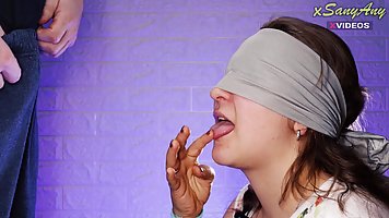 Blindfolded babe is about to play a tasting game, until she ends up sucking cock