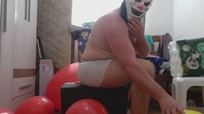 Heavy man 100kg, 220lbs sitting and popping balloons