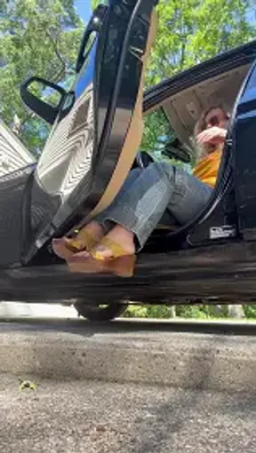 Black BMW, Blue Nails and Yellow Wedged Sandals Tease in the Driver's Seat