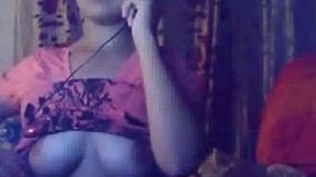 Sexy mulatto babe shows her titties and her pussy on webcam