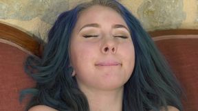 Pierced chick with colored hair rubs her wet pussy