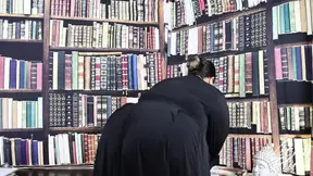 Slutty librarian Vicky jacks off in her library