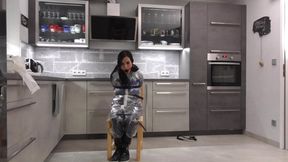 Miss Amira in Lepper nylon rain gear and a transparent rain suit is tightly bound and gagged (BTS)