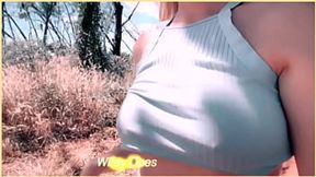 Spouse reveals tender underboob while strolling through nature path