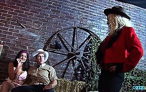 Curvy milfs nailed by two cowboys at a barn in a superb group sex action