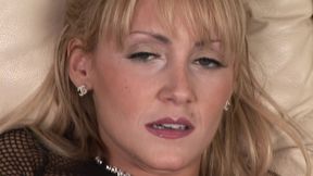 Pierced mature masturbating and fingering