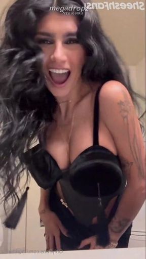 Busty Mia Khalifa cleans passionately with assets exposed