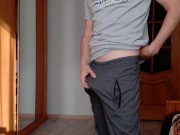 Guy in sweatpants masturbates his big cock and cums on the table