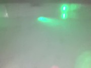 Underwater jerk off session in backyard in steamy hot tub glowing at night.