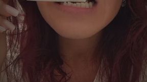 My white cigarette is softened, licked and nibbled with teeth, pissed and smoked