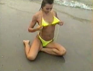 My gorgeous wife in bikini masturbating on the beach