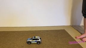 Sneaker-Girl Akira - Toy Police Car Crush