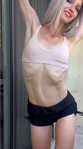 Outdoor Stretching with Skinny Blonde Dancer