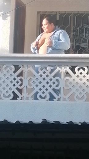 Showing my tits from the balcony!