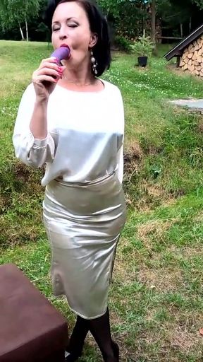 Purple dildo and black stockings