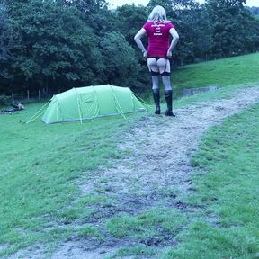 Crossdressed outdoors by the lake