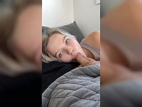 cutie sucks dick while cuddling on couch