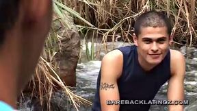 Diego is fishing in a beautiful mountain stream when Hernan comes along. Hernan sees this cute guy and grabs his attention by tossing a near him.