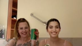 Hot girls drinking and smoking in the hot tub!