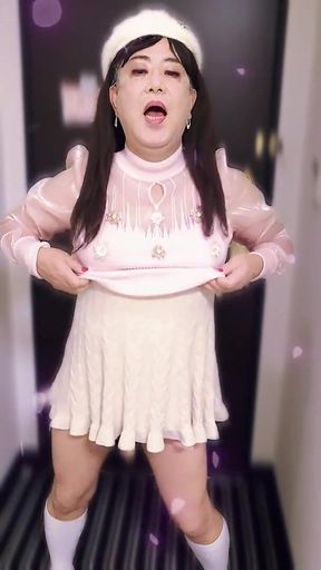 Dressed in a Cute, Feminine Outfit, She Masturbates While Standing up