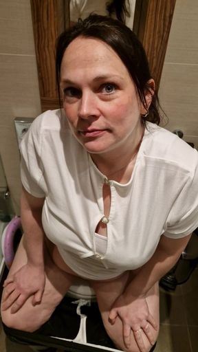 Pregnant slut goes to piss.