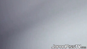 Delectable Japanese sexy girl is peeing outside during day time