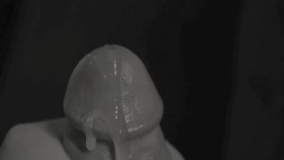 Extreme close up cumshot in slow motion of a hard big cock