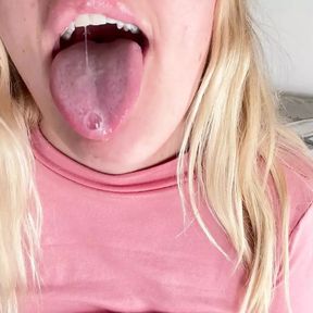 Does a slimy tongue turn you on while I spit on my tits?