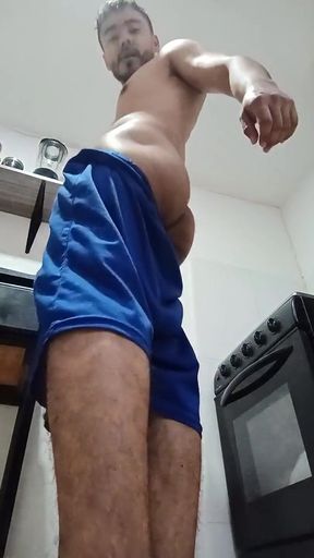 Man Masturbating in Shorts in His Kitchen