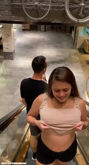 Amateur teen with big natural boobs exposes her tits in public