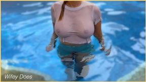 Wife's soaked shirt in the pool showing flawless braless breasts