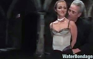 Sexy girl is bound, fucked, dunked and sprayed.
