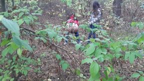 one girl pissed in the forest and how the second girl gave her cunnilingus