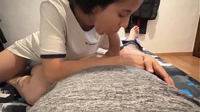 A petite young black-haired girl craves a big cock