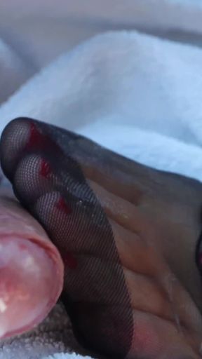 Jaw-dropping moment from &quot;Mistress takes her time with nylon footjob&quot;