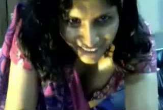 Happy genuine Indian lady in saree milks her boobs on webcam