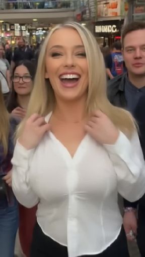 titty drop, a laughing, blonde Caucasian woman, video created by AI