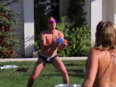 Bisexual swingers are kissing outdoors