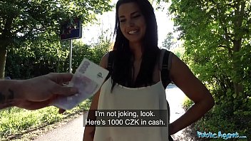 Big-titted brunette blows stranger's big cock outside