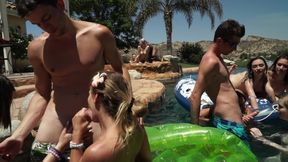 A massive blowbang swimming pool party