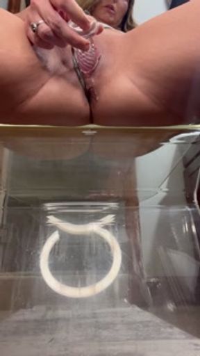 Sexy Amateur MILF on big black dildo, squirts all over bathroom