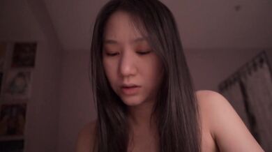 Cute Asian girl whispers Bible instructions trembling alone