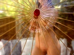 Beautiful Asian model in sensual naked photoshoot outdoors