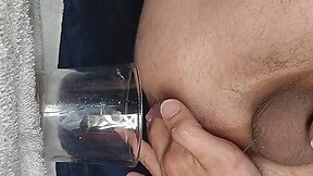 cumdumping: pushing 7 loads out his ass into cup with sperm and anal toys