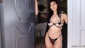 Hot brunette's footfuck in sexy black lingerie on bed.