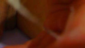 Masturbating