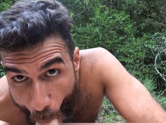 Bearded stud sucking a strangers big cock outdoor