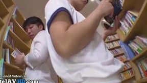 Excited Japanese Teen Gets Intimate With Stranger Amidst Public Library Shelves