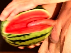 Muscular Stud Fucks and Cums on Watermelon